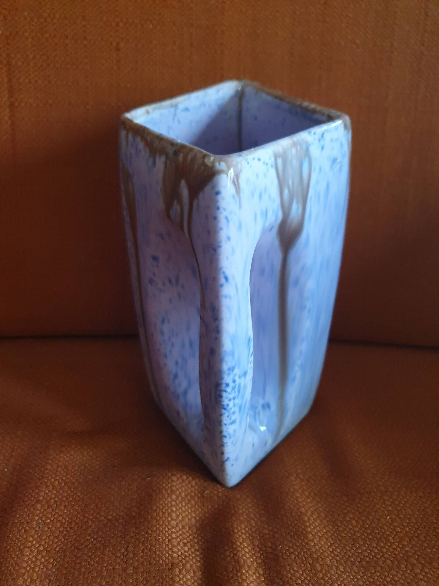 Beautiful iridescent mauve ceramic jug.