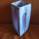 Beautiful iridescent mauve ceramic jug.
