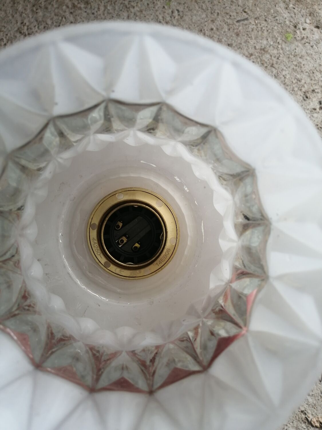 Vintage globe pendant light in molded glass.