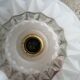 Vintage globe pendant light in molded glass.