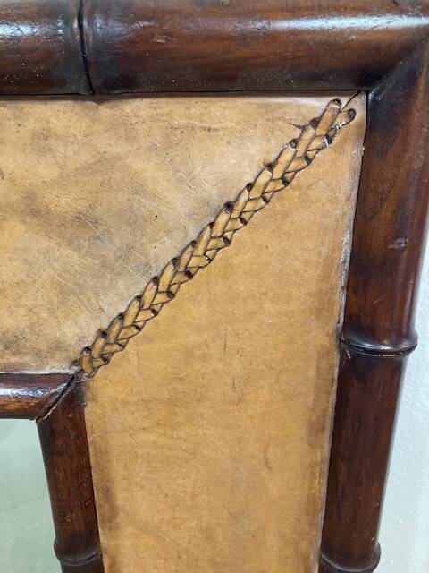 Big faux bamboo and leather mirror