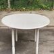 Louis Philippe round dining table with folding shutters repainted in beige grey