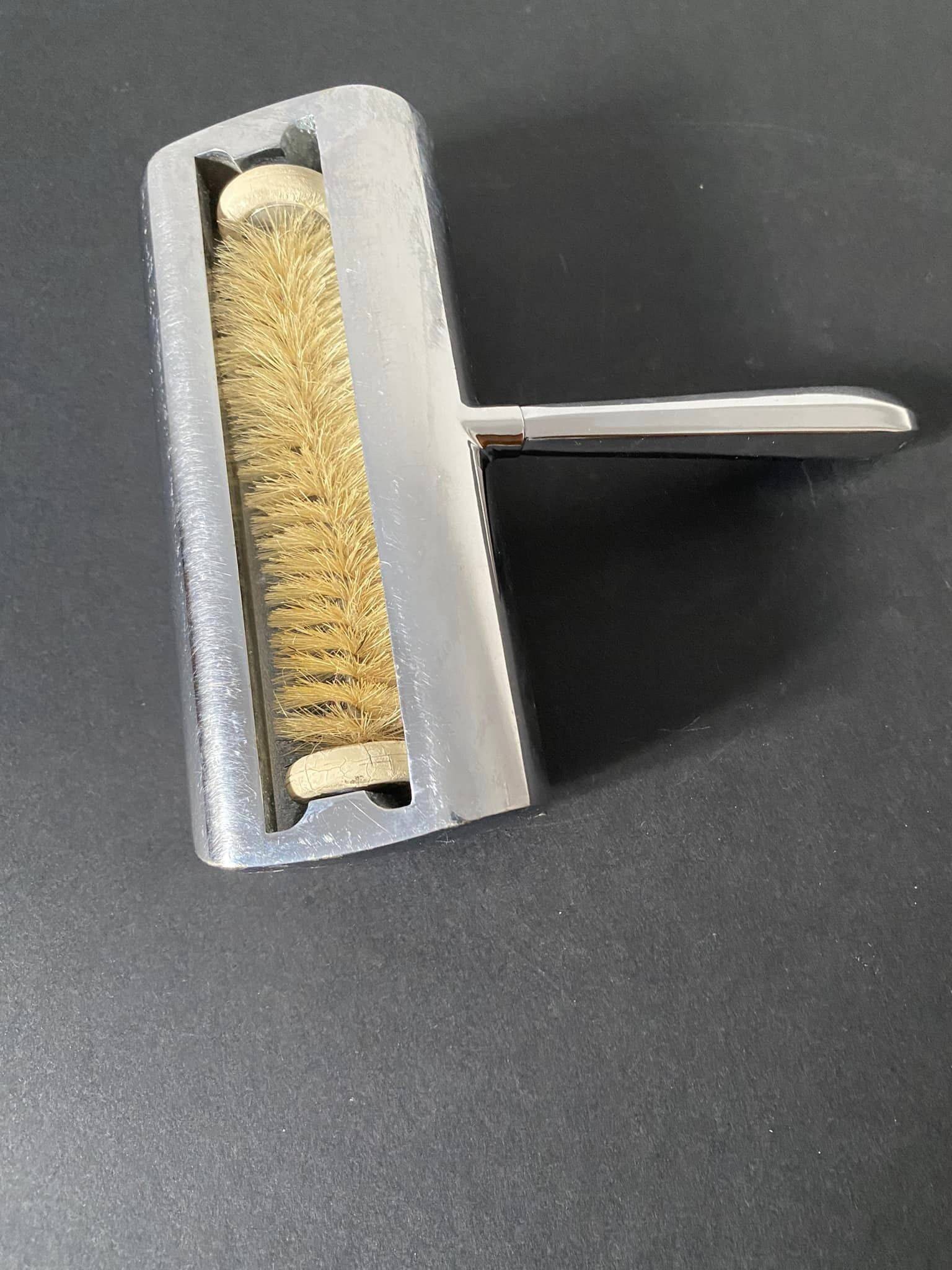 Vintage silver table crumb catcher with stainless steel handle