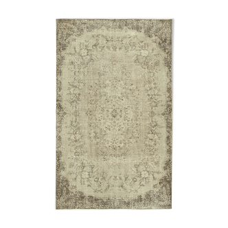 Hand-knotted vintage turkish beige rug 173 cm x 275 cm