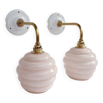 Swan neck and glass globe wall lights
