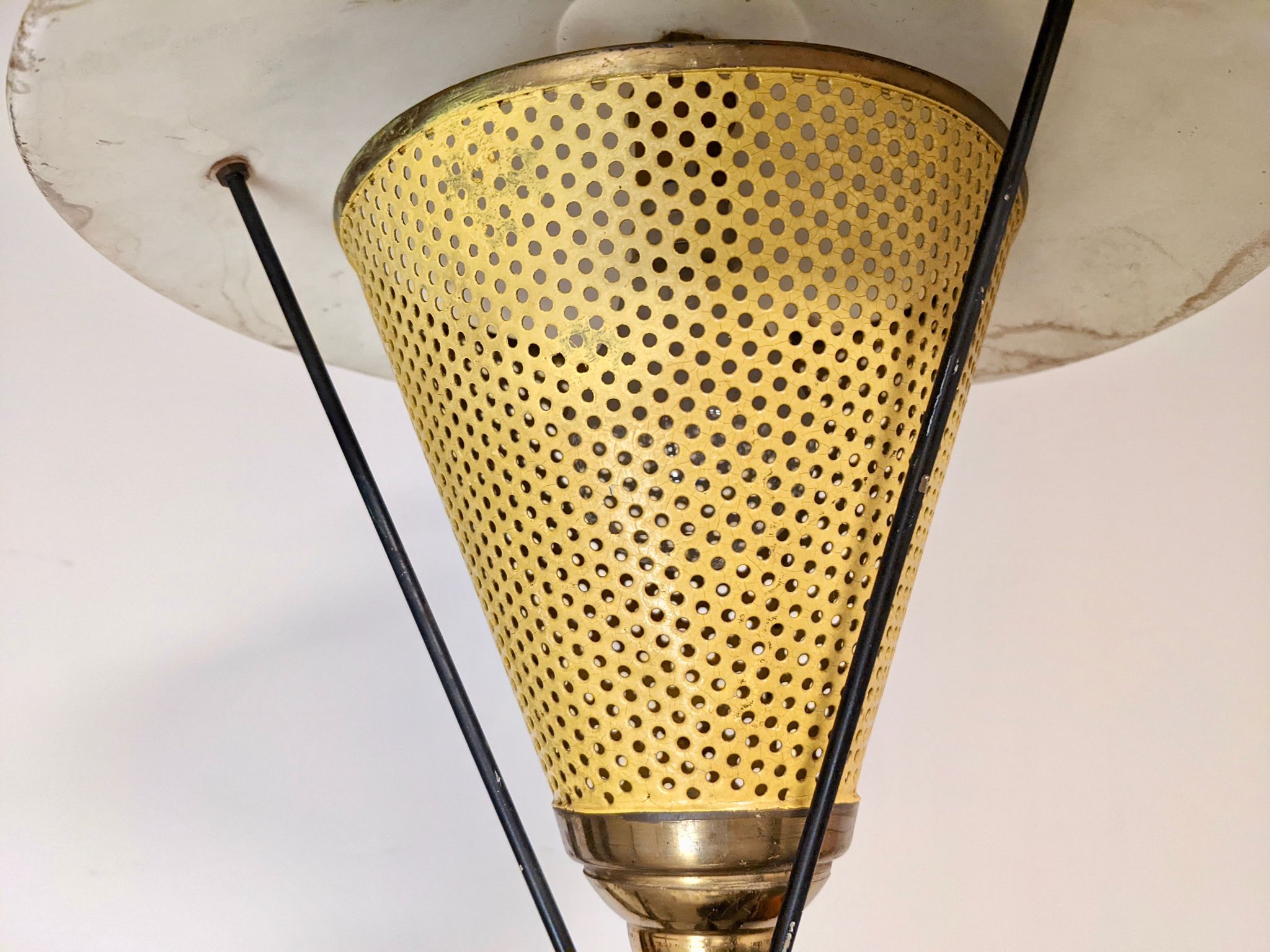 Suspension in perforated sheet metal