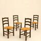 Set of four chairs in the style of Perriand.