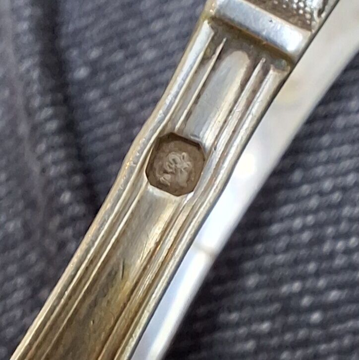 Solid silver sugar or ice tongs with lion's paw decoration