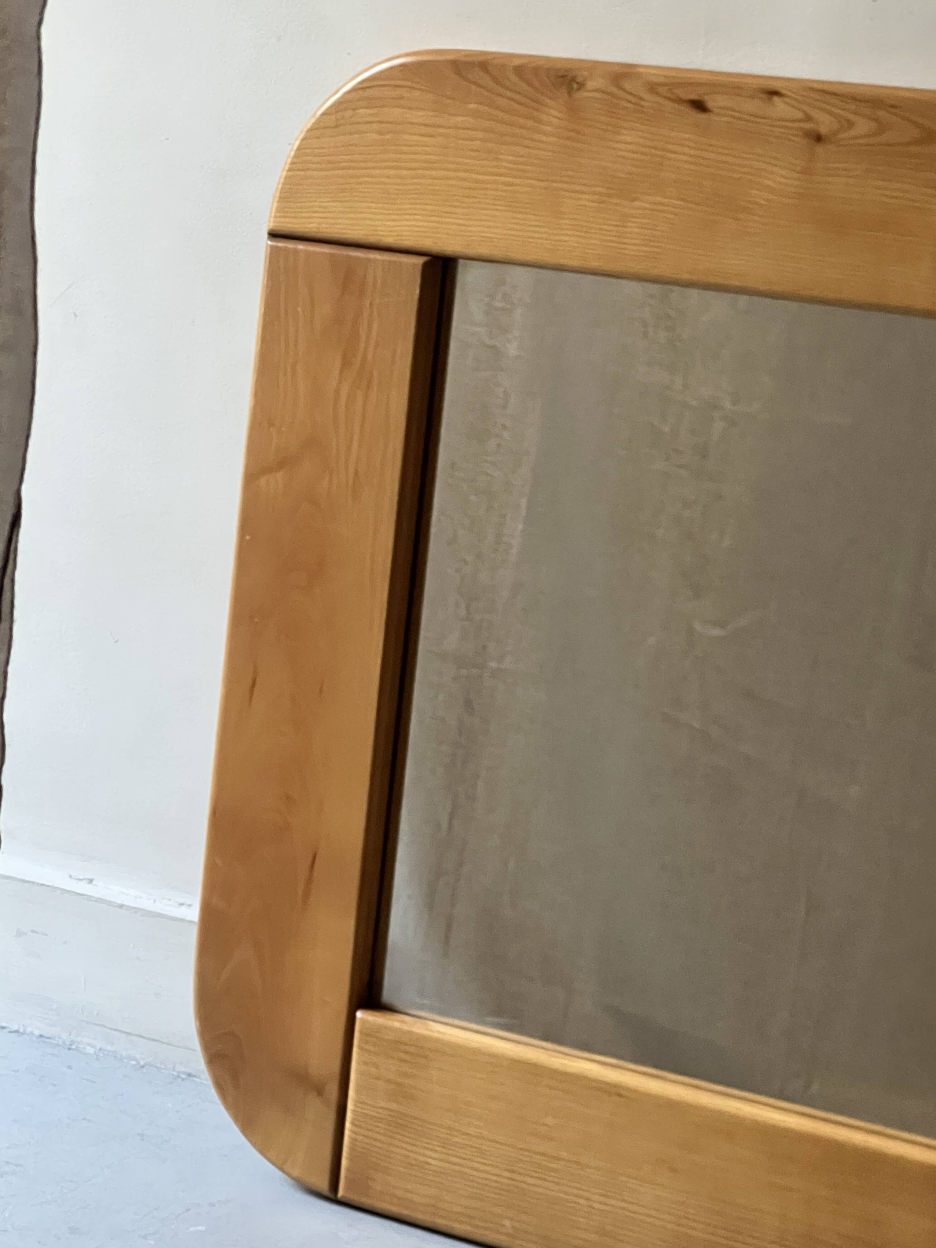 Large oak mirror in the style of a revival house, 1970s design.