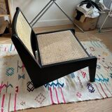 Teak and cane armchair