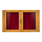 Vintage wall display cabinet in moulded wood and glass – burgundy background