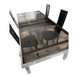 Vintage Roche Bobois dining table with smoked glass and 4 leather chairs.