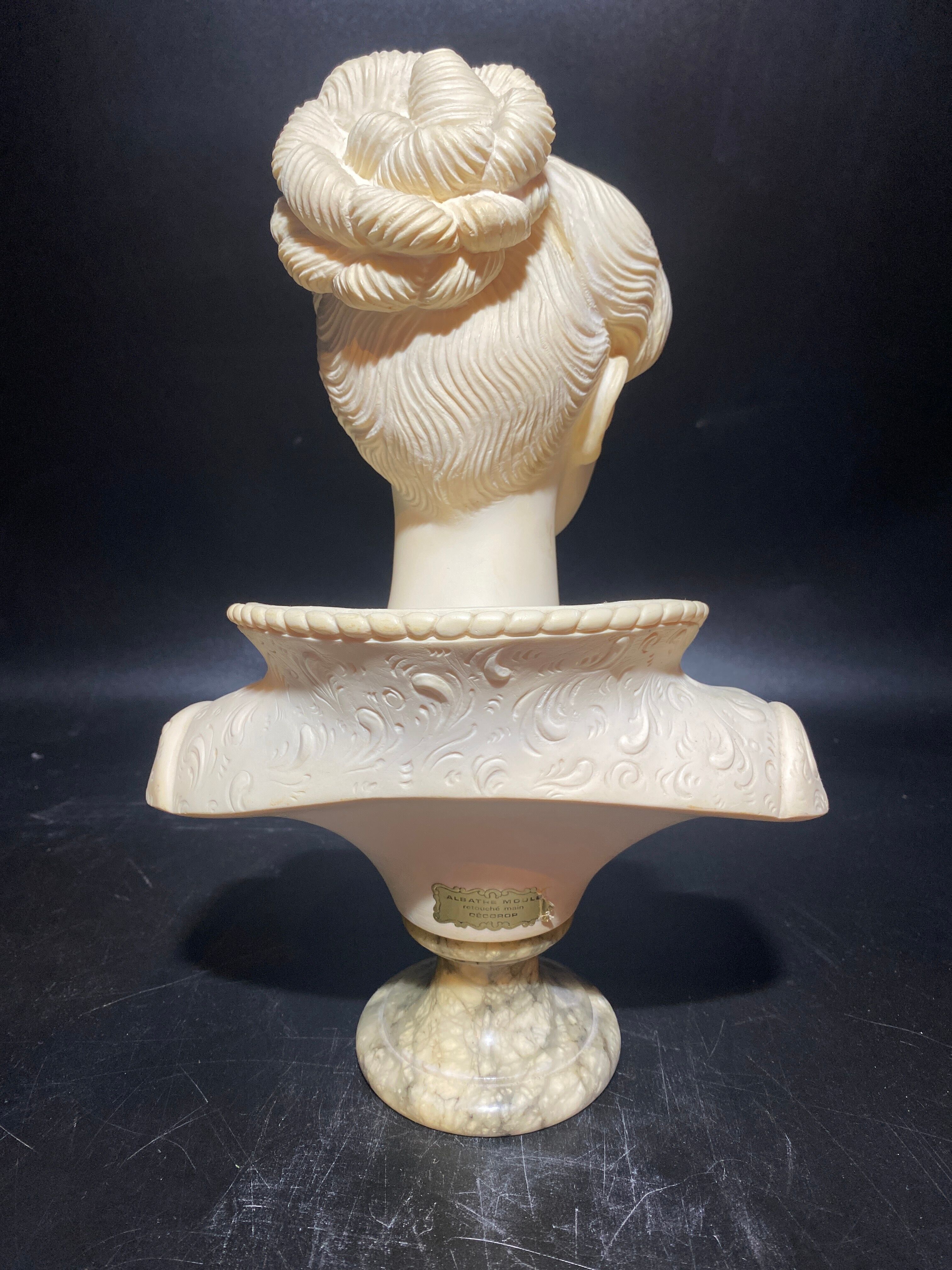 Hand-retouched cast plaster bust