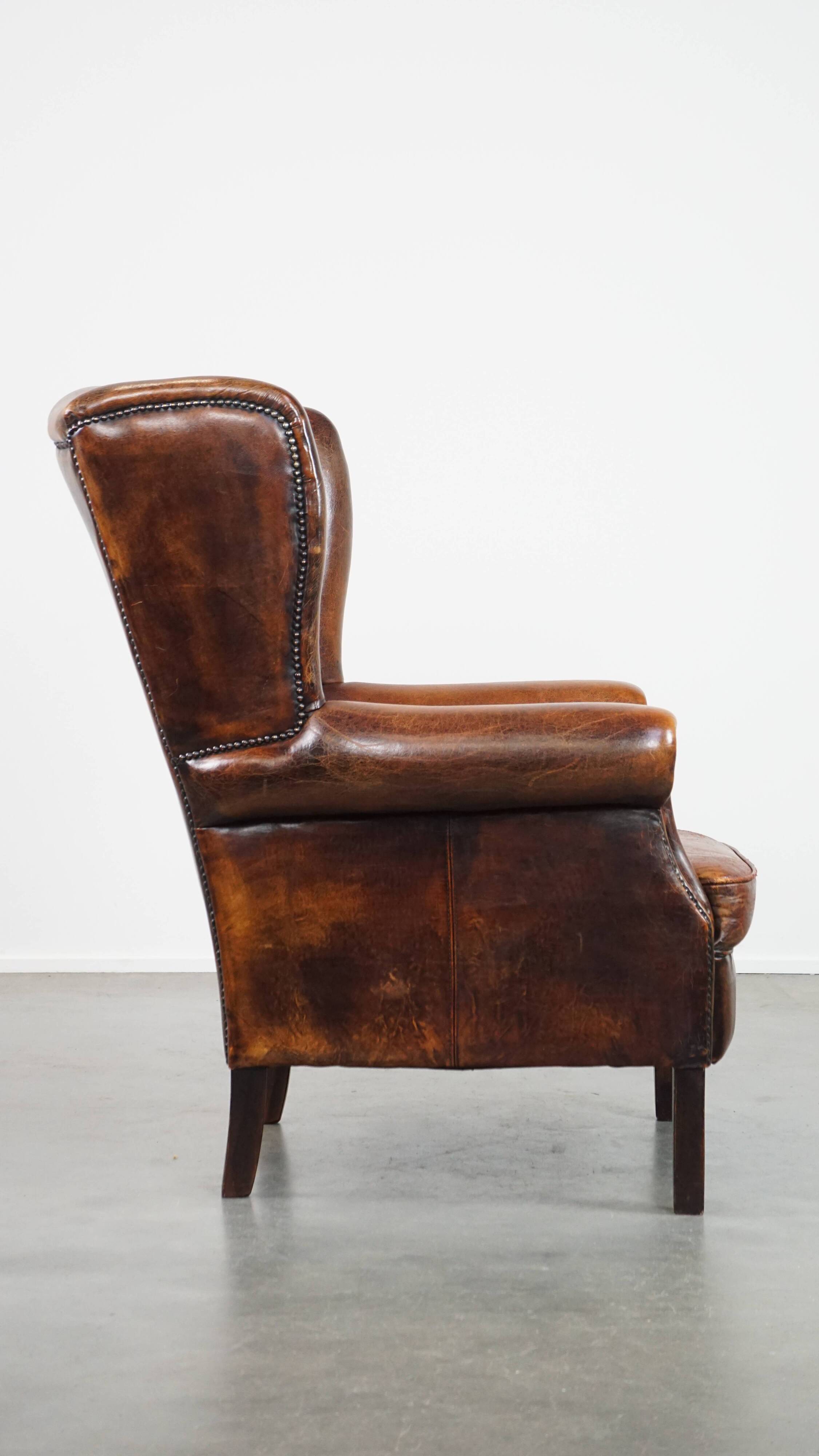 Vintage sheep leather wingback chair