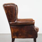 Vintage sheep leather wingback chair