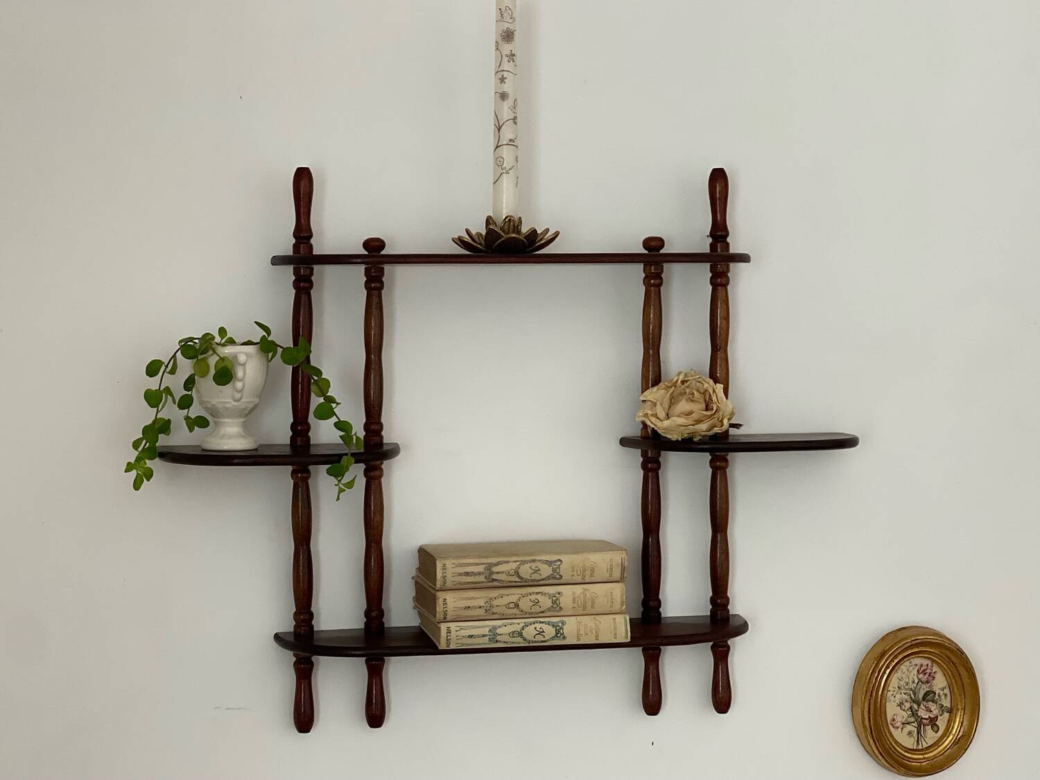 Turned wood wall shelf