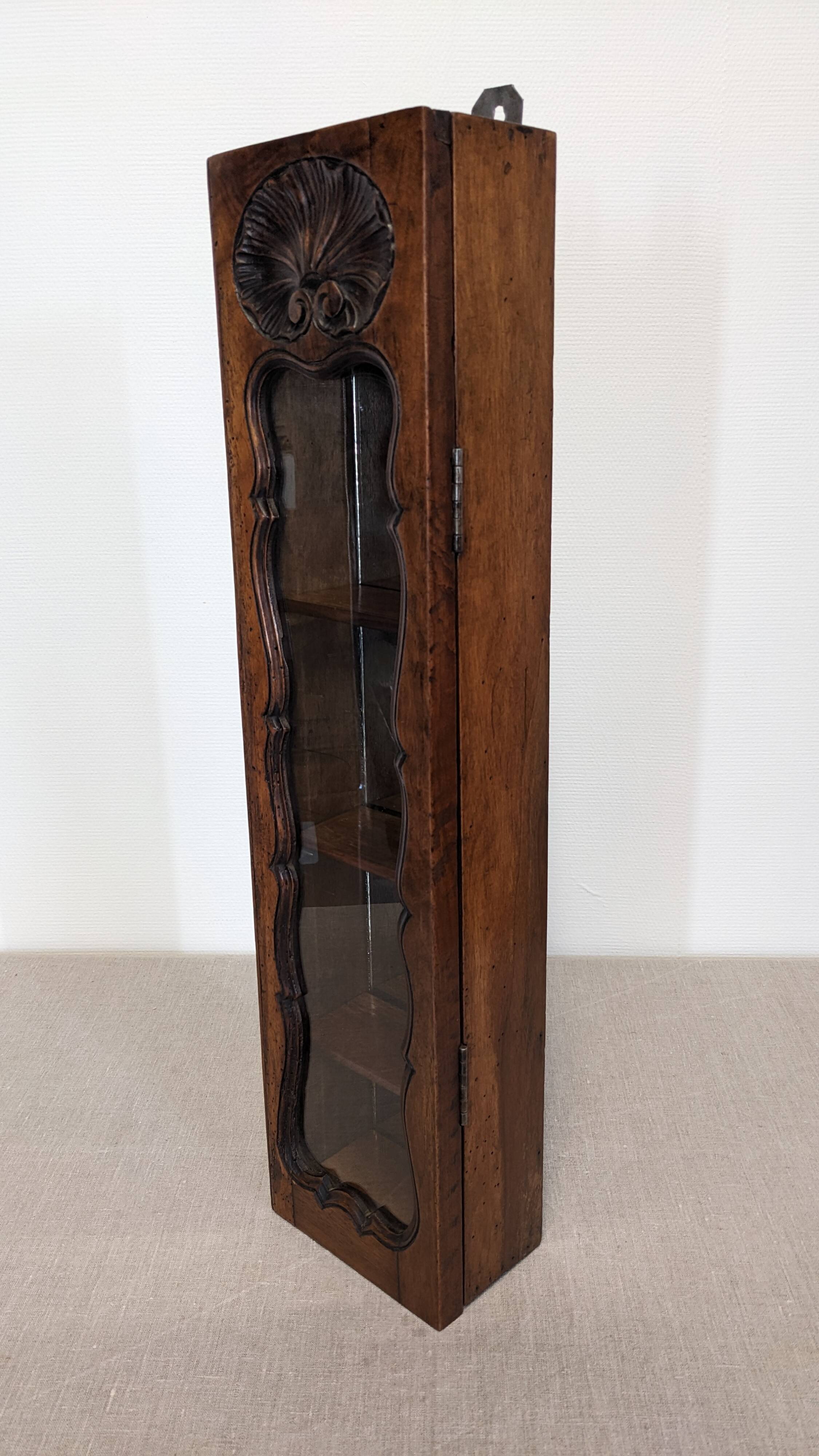 Louis XV style wall display cabinet in walnut, France mid-20th century.