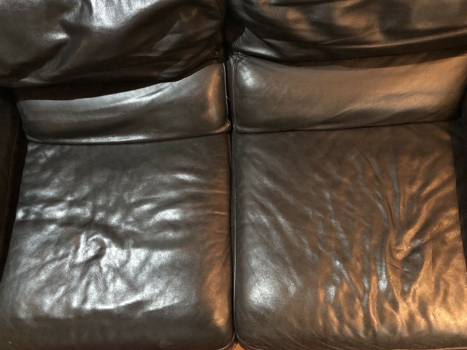 Pair of 2-seater sofas in black leather Roche & Bobois