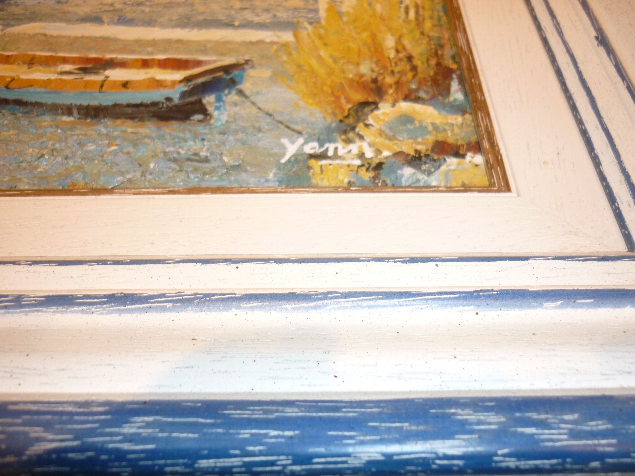 Oil on canvas of a boat on the foreshore signed Yann 55X45