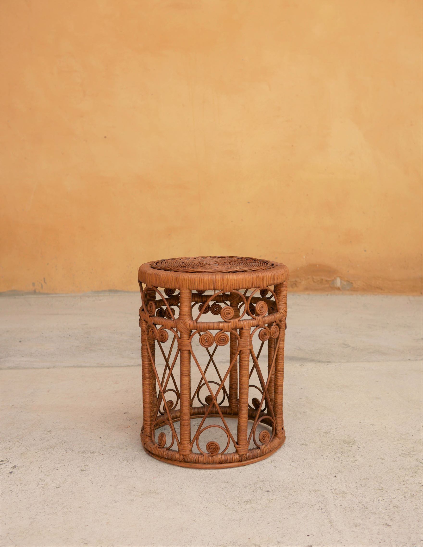 Vintage peacock stool in rattan