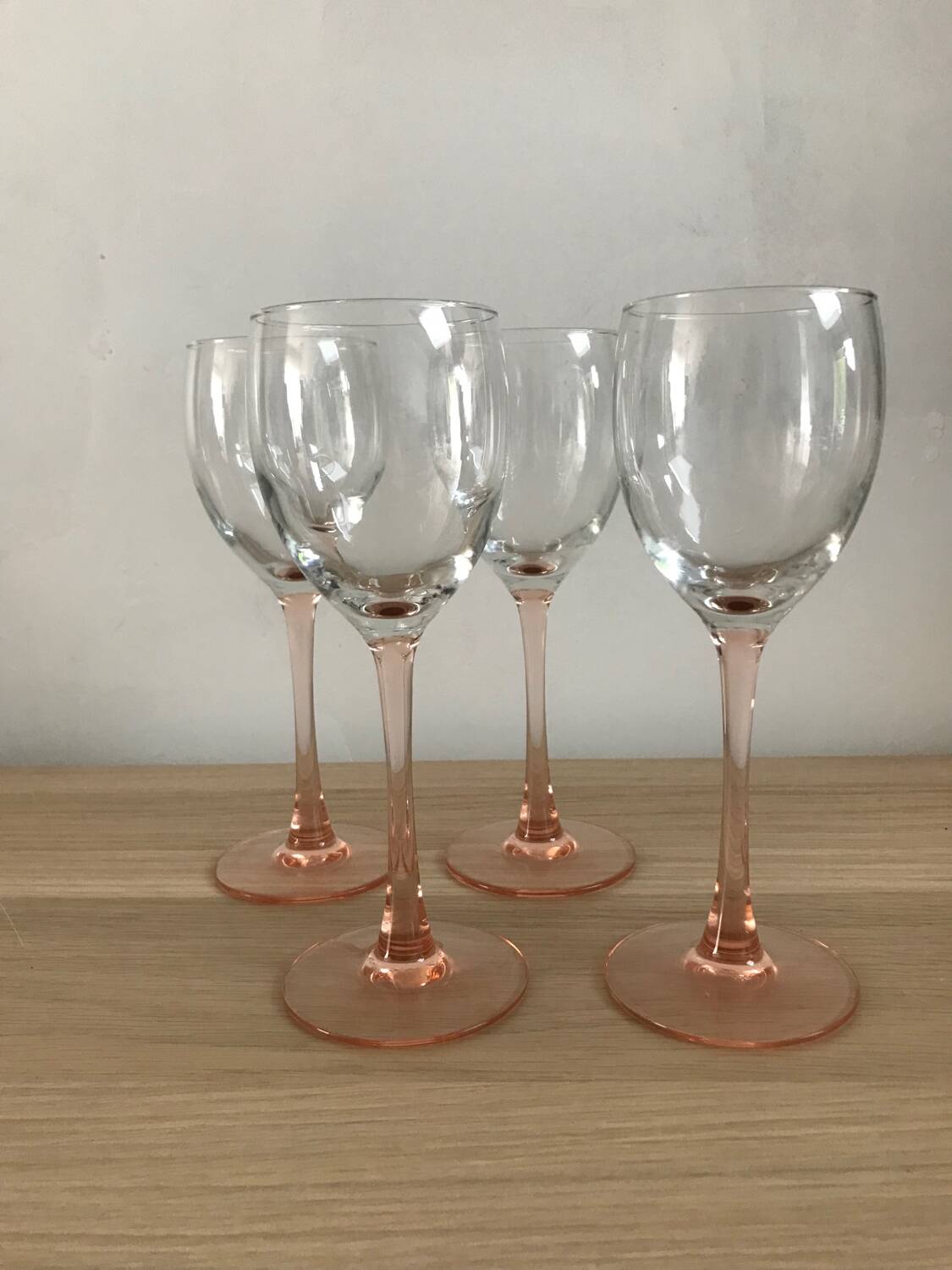 4 luminarc wine glasses with pink base