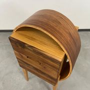 Oval wooden commode by Kreatippcci Studio