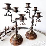 Pair of antique wooden and brass candlesticks