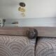 Art Deco wall coat rack with 3 hooks and a mirror.