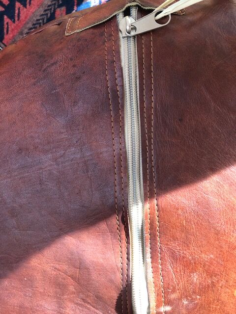 Round leather floor pouf