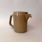 Brown ceramic pitcher