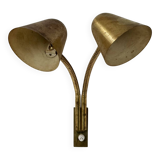 Double orientable vintage patinated brass wall light, Jacques Biny France 1950.