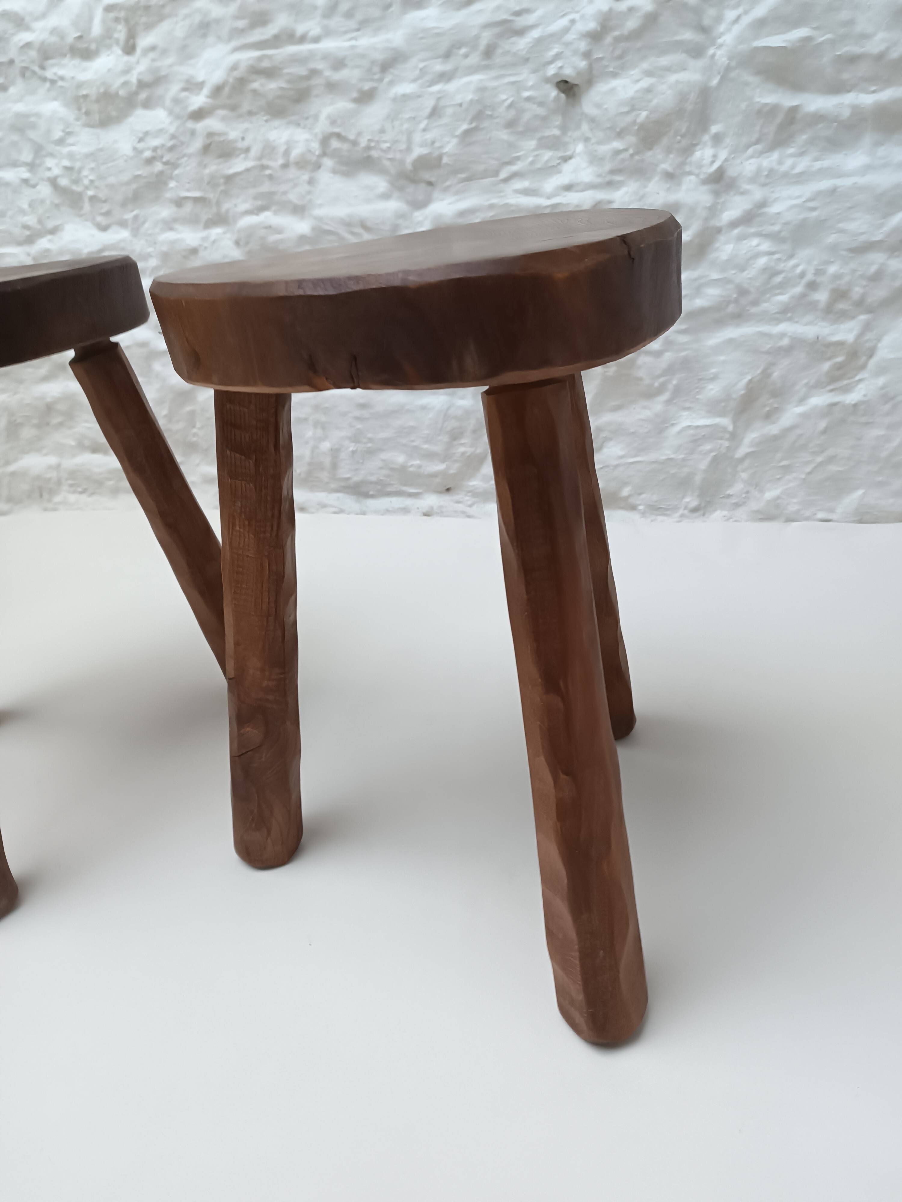 Pair of tripod stools in vintage 50s/60s brutalist elm.
