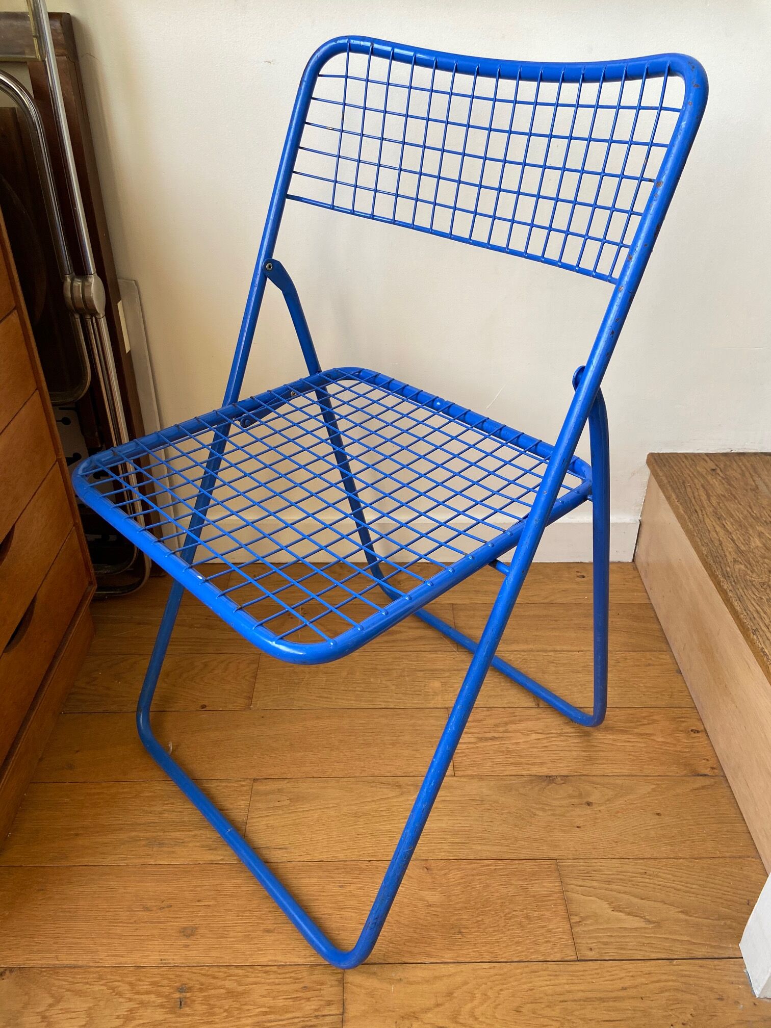 Blue "Ted Ned" folding chair by Niels Gammelgaard