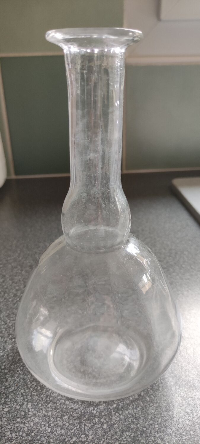 Antique decanter with its original cap