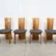 Set of four sculptural brutalist oak chairs