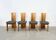 Set of four sculptural brutalist oak chairs