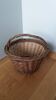 Woven wicker basket with handle