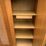 Rattan wardrobe and its compass-legged chest of drawers, 1960