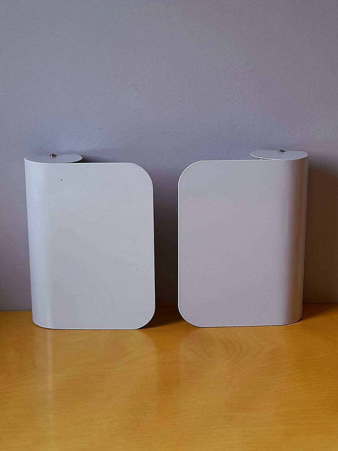 White lacquered metal wall sconces