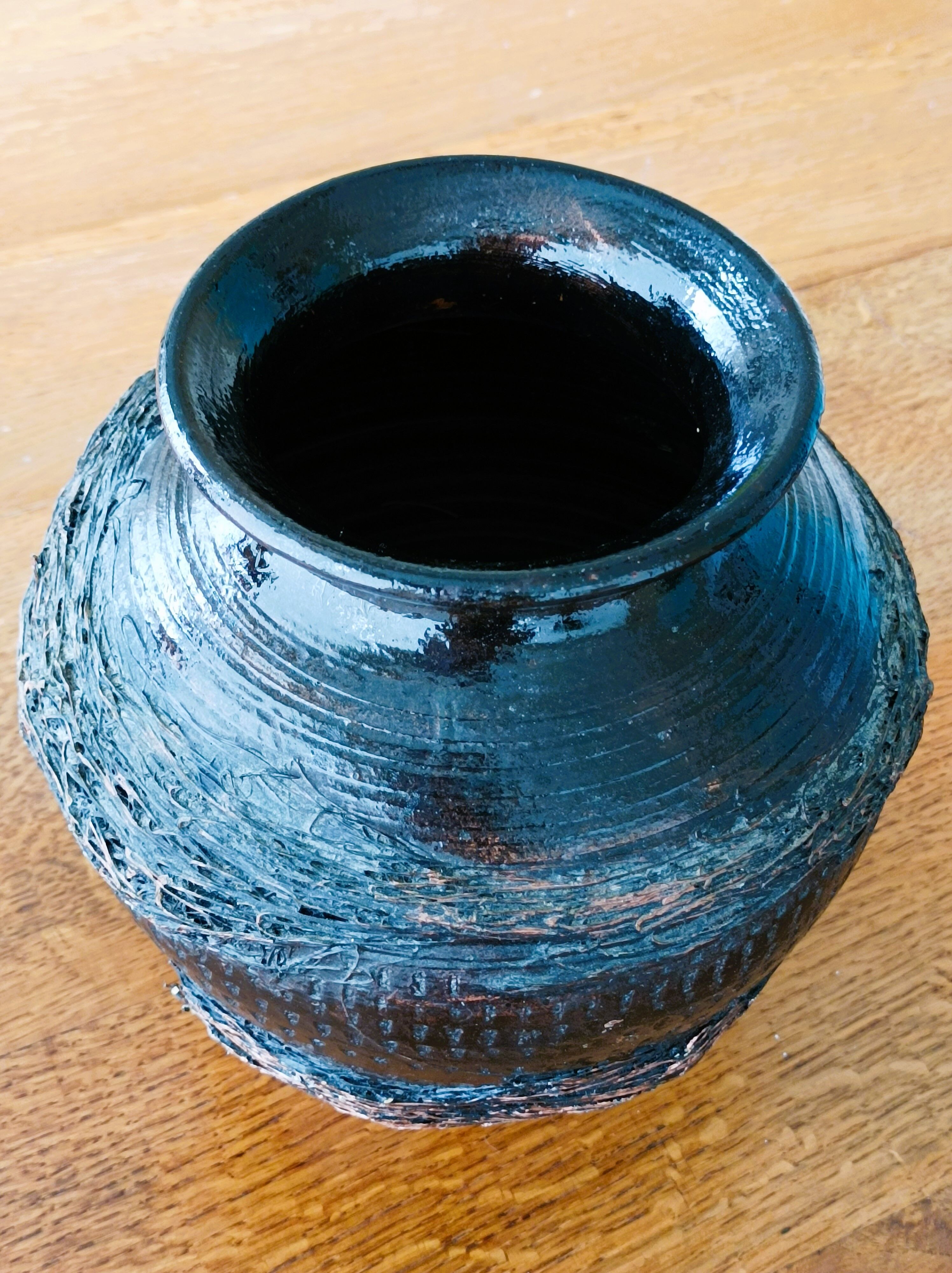 Black varnished terracotta pot