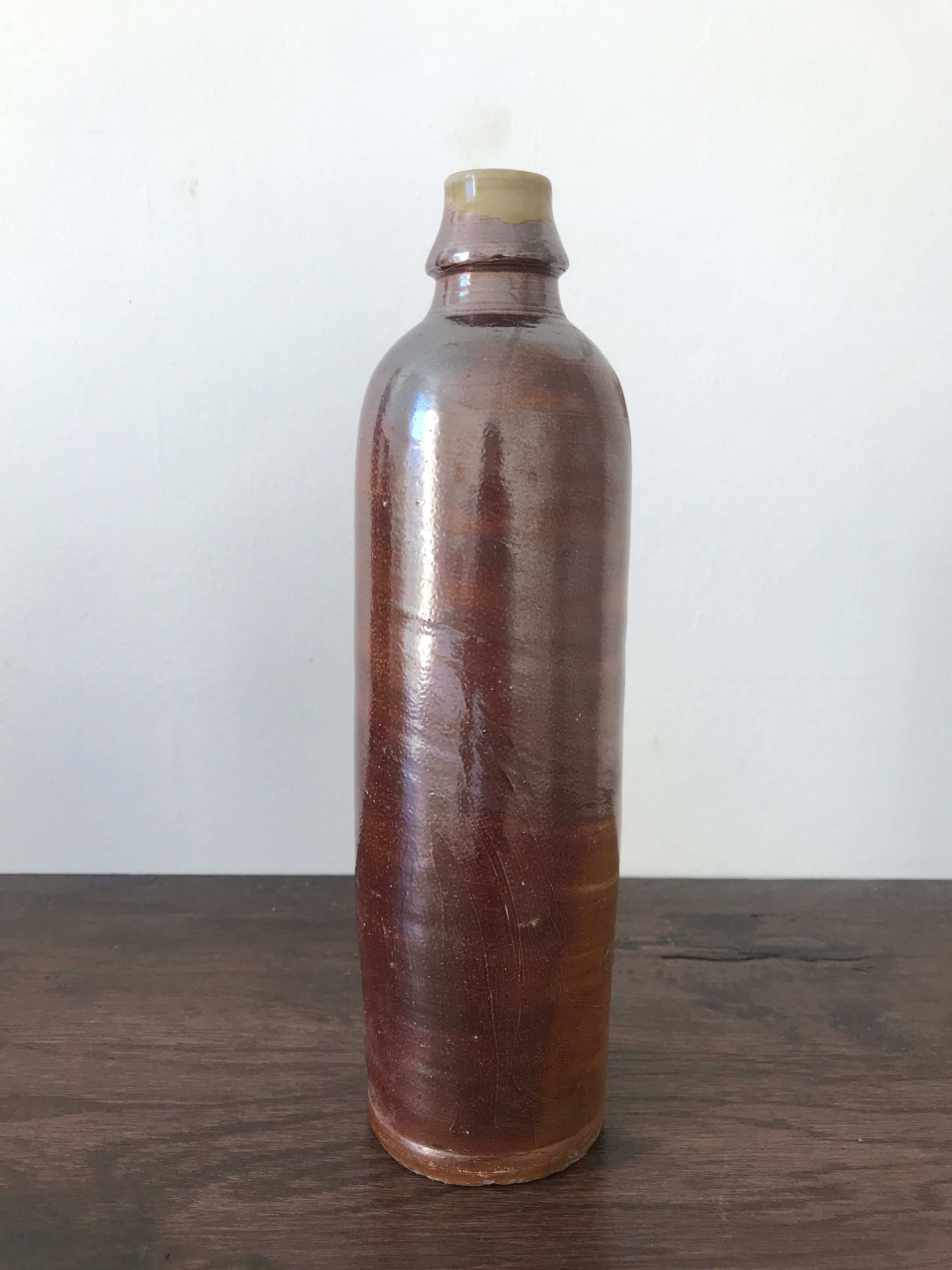 Pair of sandstone bottles