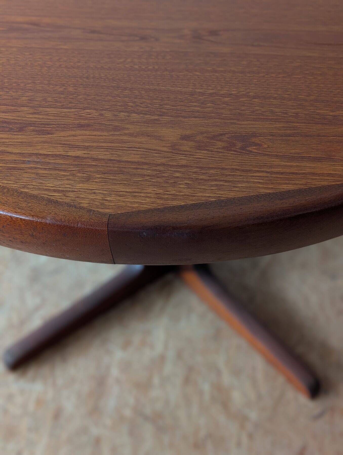 Round teak table with star base, 1960s, extendable.
