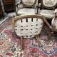 Suite de cinq fauteuils à dossier médaillon de style Louis XVI