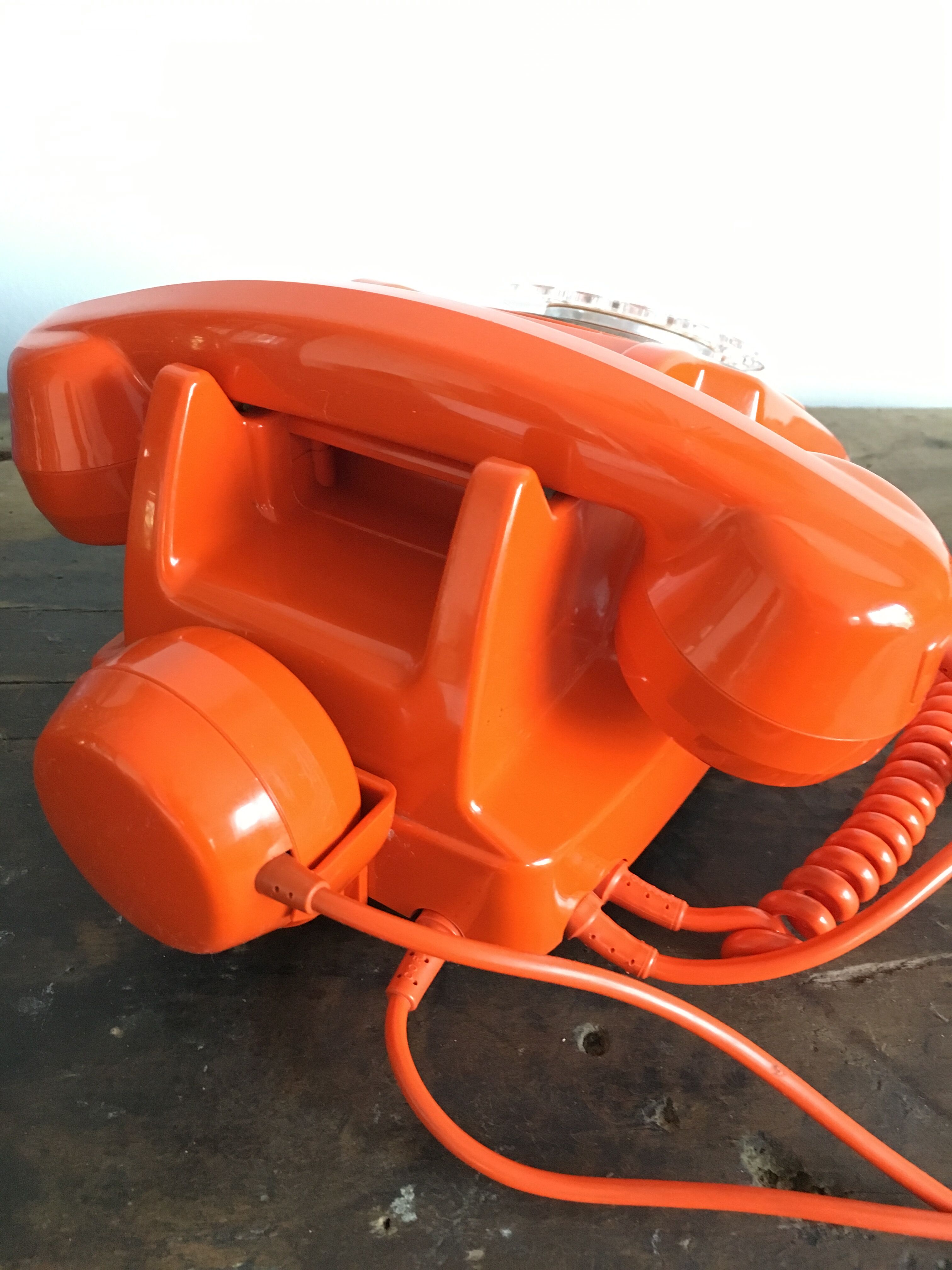 Orange vintage dial phone