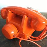 Orange vintage dial phone