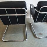 Set of 2 lounge chairs in vintage leather late 80s, comfortable and in good condition