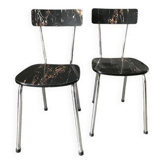 Chairs in marbled black Formica