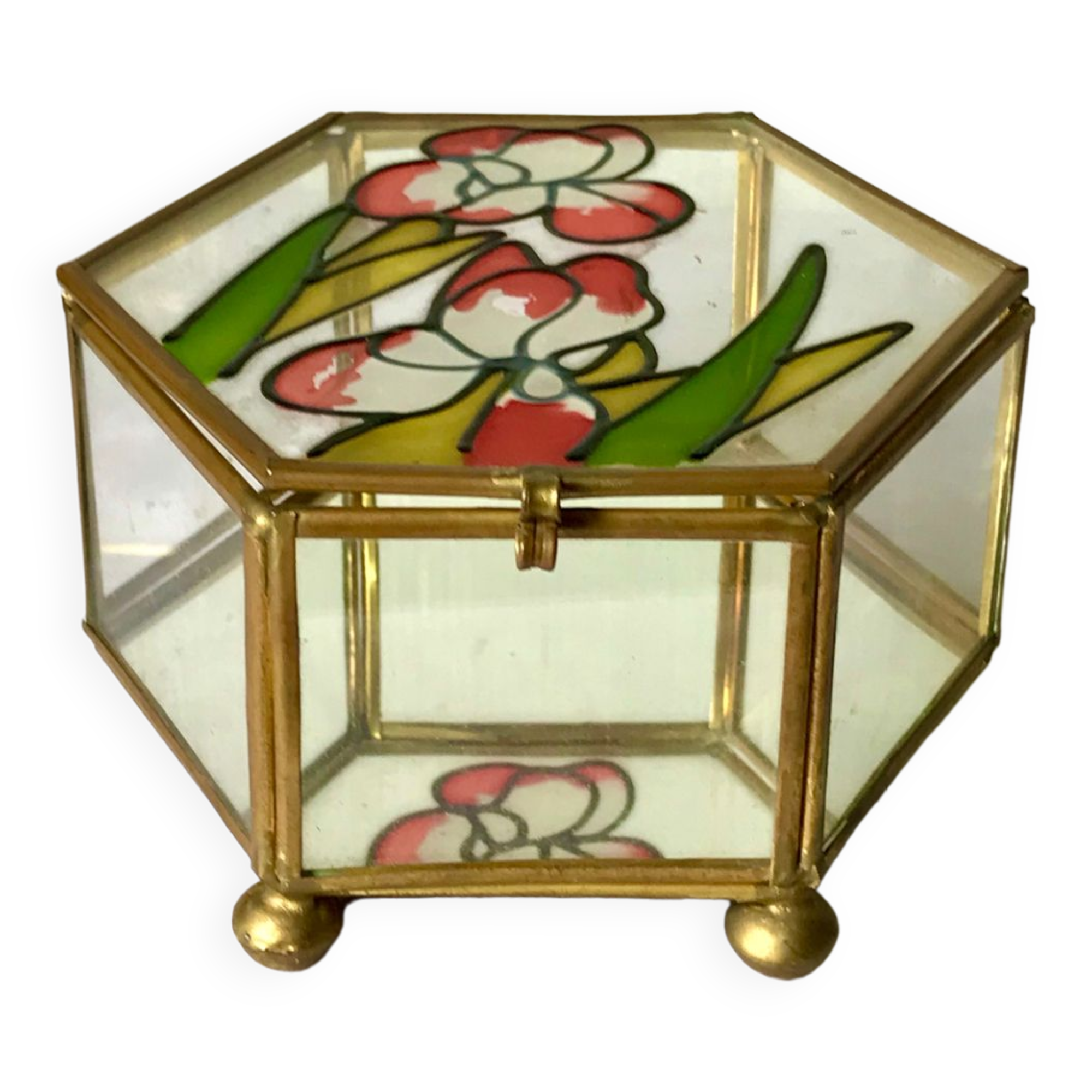 Glass box and hexagonal brass enamelled floral decoration