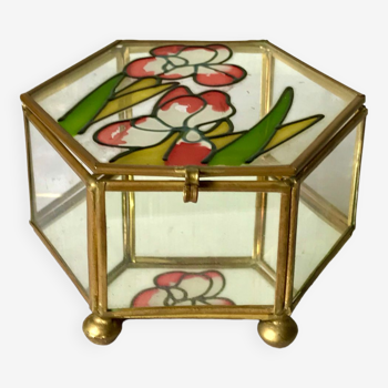 Glass box and hexagonal brass enamelled floral decoration