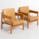 Paire de fauteuils en chêne et cuir par Uluv Krasna Jizba, années 1960